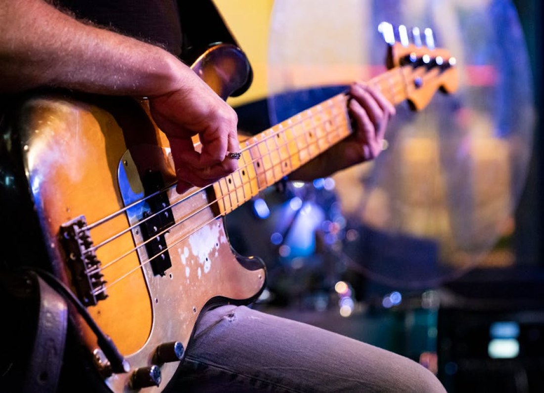 Keanu Reeves playing bass guitar