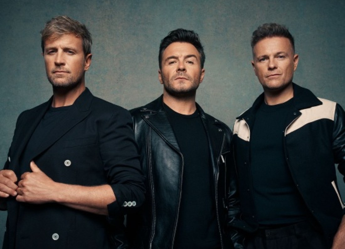 Westlife band performing