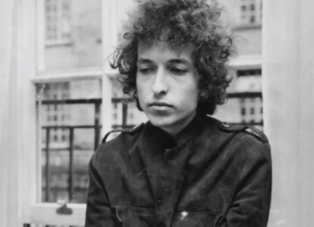 Bob Dylan performing on stage